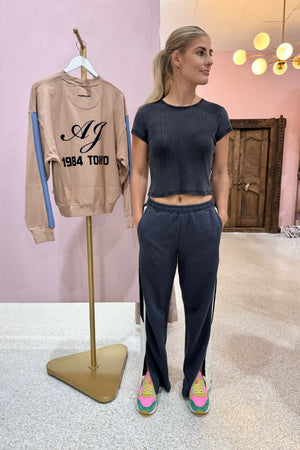 The Laundry Room Baby Essentials Tee | Black Snow