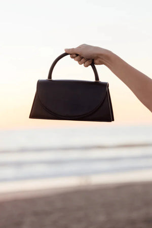 Olga Berg The Hailey Top Handle Clutch Bag | Black