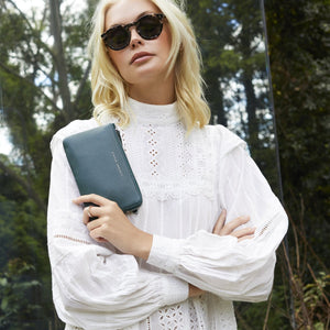 status-anxiety-wallet-smoke-and-mirrors-teal-1