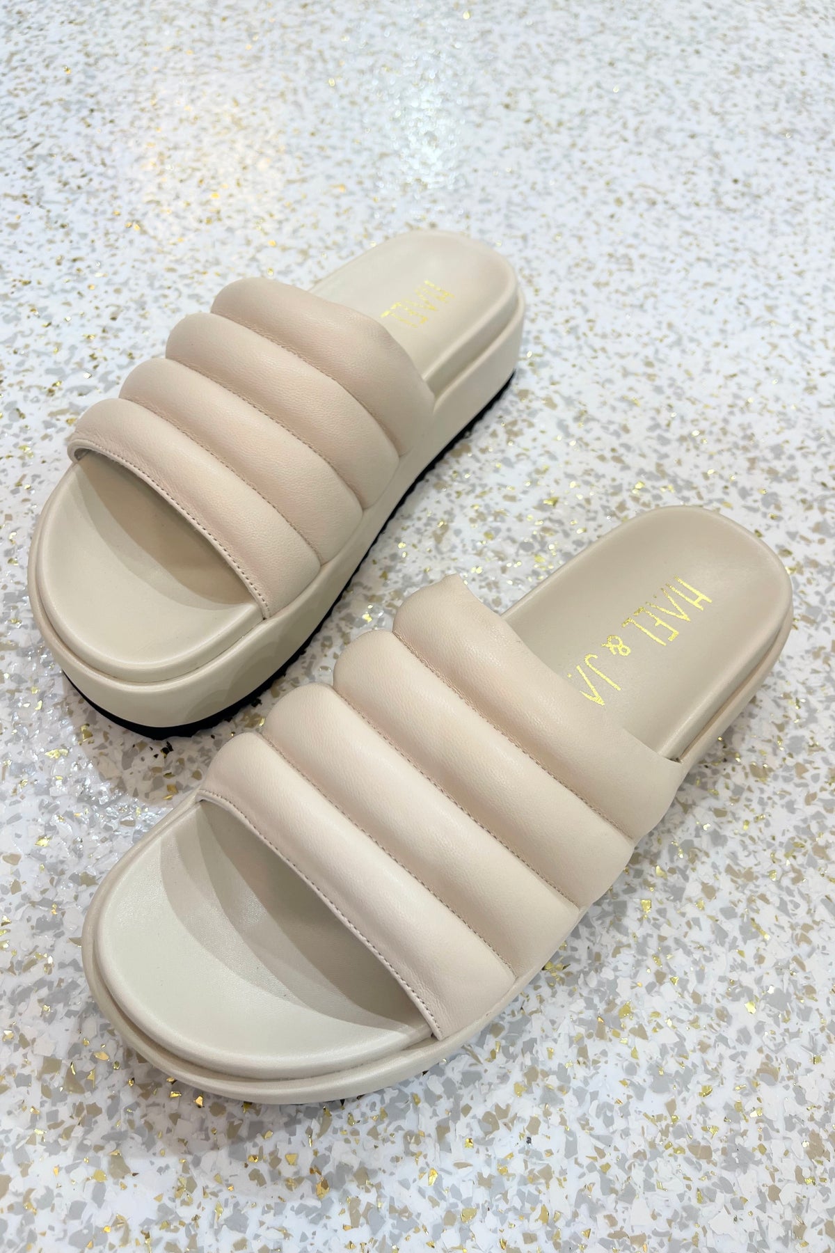 Hael & Jax Melanie Platform Slide | Vanilla