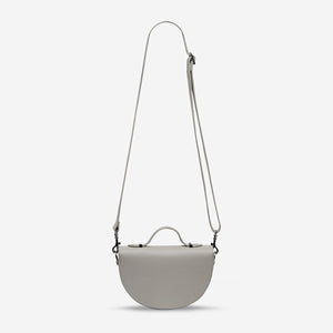 status-anxiety-bag-all-nighter-light-grey-back-hanging
