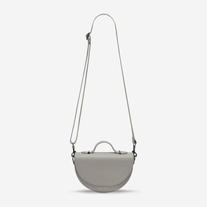 status-anxiety-bag-all-nighter-light-grey-front-hanging
