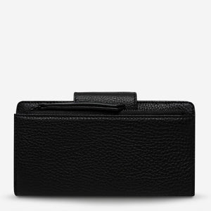 status-anxiety-wallet-ruins-black-back