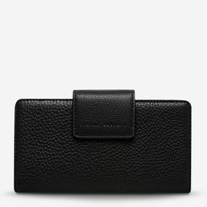 status-anxiety-wallet-ruins-black-front