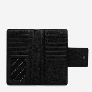 status-anxiety-wallet-ruins-black-inside-flat