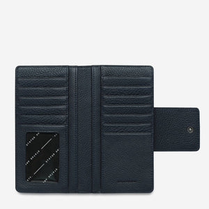 status-anxiety-wallet-ruins-navy-blue-inside-flat