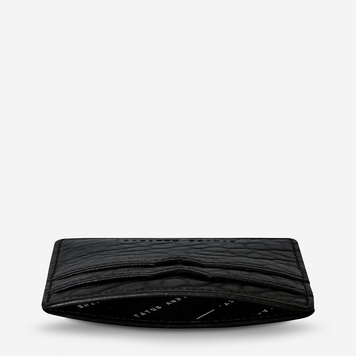 status-anxiety-wallet-together-for-now-black-bubble-top-angle